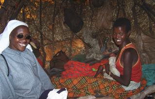 Sister with young girl and her newborn.